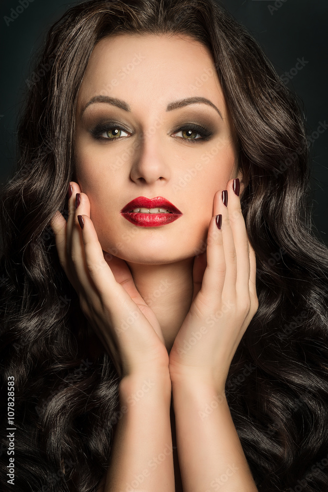 Gorgeous woman portrait with makeup red lips and smoky eyes Gorgeous woman portrait with makeup red lips and smoky eyes