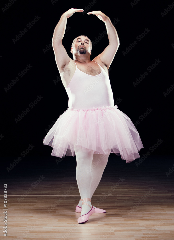 Naklejka premium funny fat classical dancer on black background