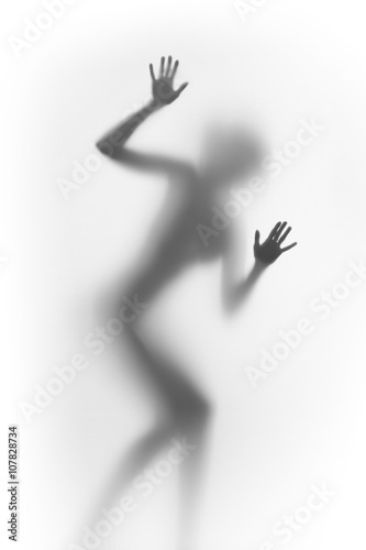 Silhouette of a woman, hands, fingers and diffused body.