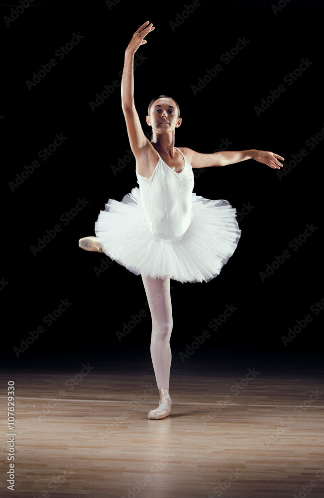 Naklejka premium beautiful classical dancer on black background