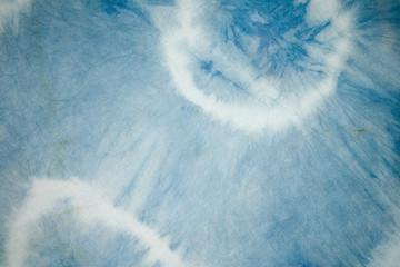 Tie-dyed with natural colors Background texture