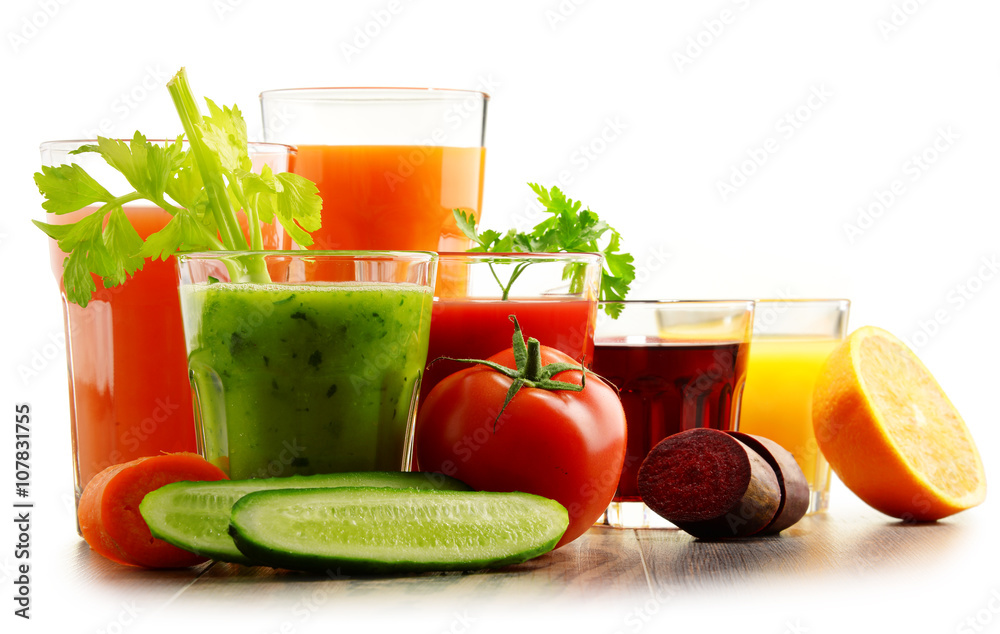 Glasses with fresh organic vegetable and fruit juices Glasses with fresh organic vegetable and fruit juices