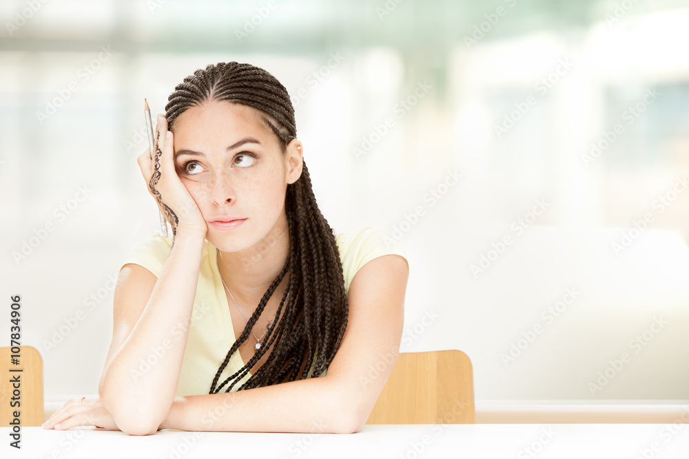 Beautiful dread young woman portrait isolated at office Beautiful dread young woman portrait isolated at office