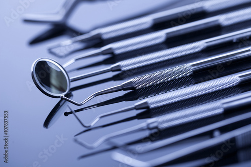 Closeup of professional dental tools on shiny table