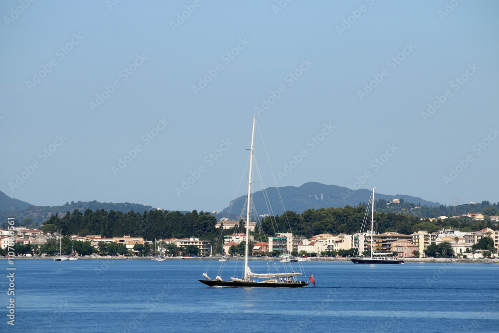 sailboat sailing near Corfu town Greece sailboat sailing near Corfu town Greece