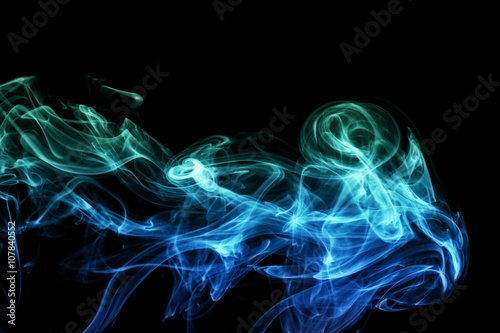 Colored abstract smoke, isolated on black background.