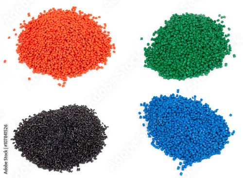 Obraz na płótnie colorful plastic polymer granules on white background