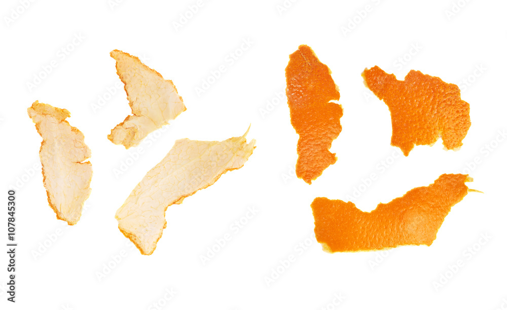 Fototapeta premium Parts of tangerine peel isolated on white background