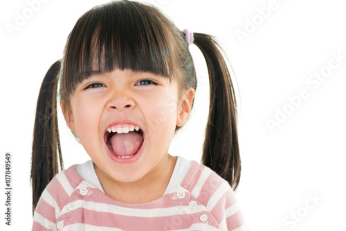 asian smiling little girl with pigtail isolated on white