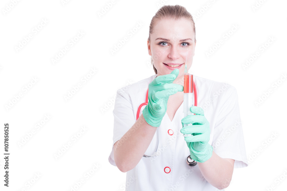 Smiling medical doctor holding syringe and getting ready for inj Smiling medical doctor holding syringe and getting ready for inj