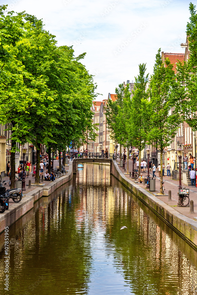 Canal in De Wallen district of Amsterdam