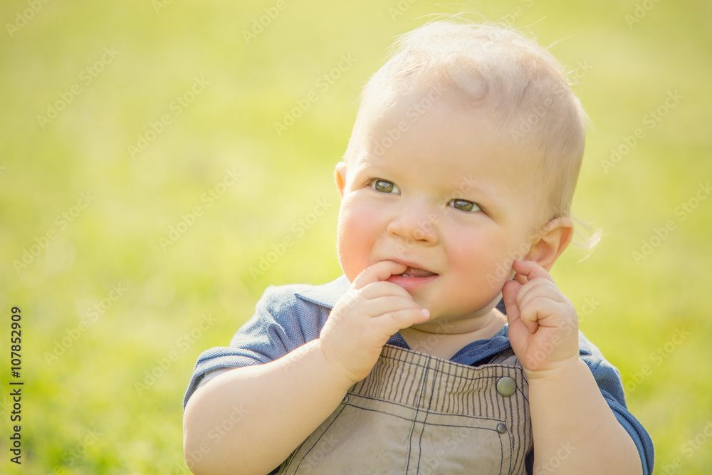 happy smiling blond child play in the park happy smiling blond child play in the park