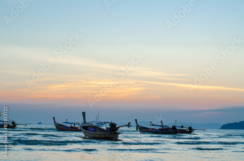 Traditional boats in Thailand at sunset