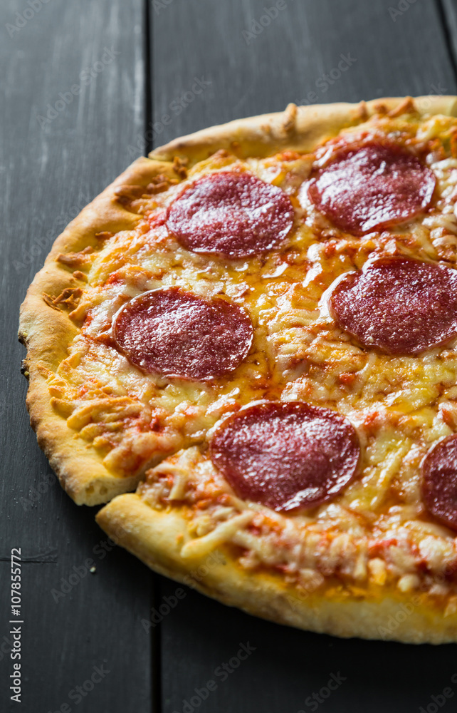 Pizza with cheese and salami Pizza with cheese and salami