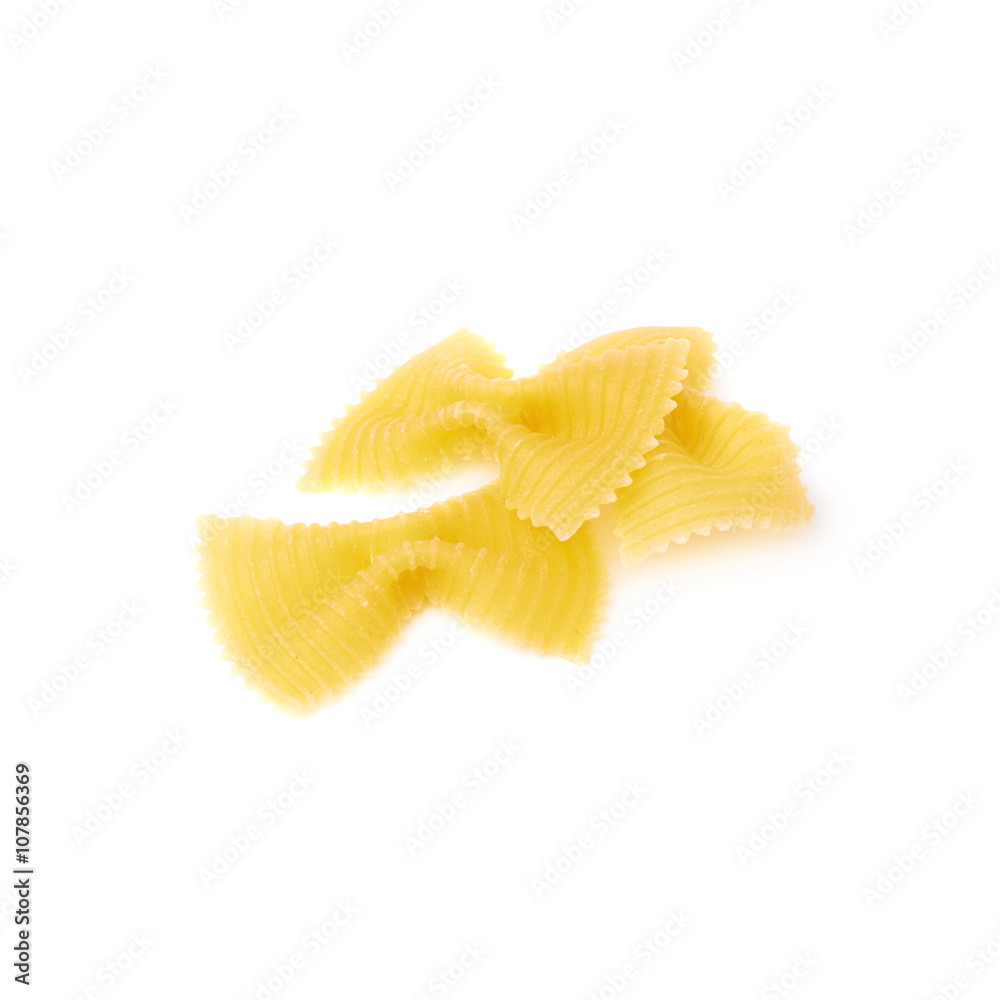 Pile of dry farfalle pasta over isolated white background Pile of dry farfalle pasta over isolated white background