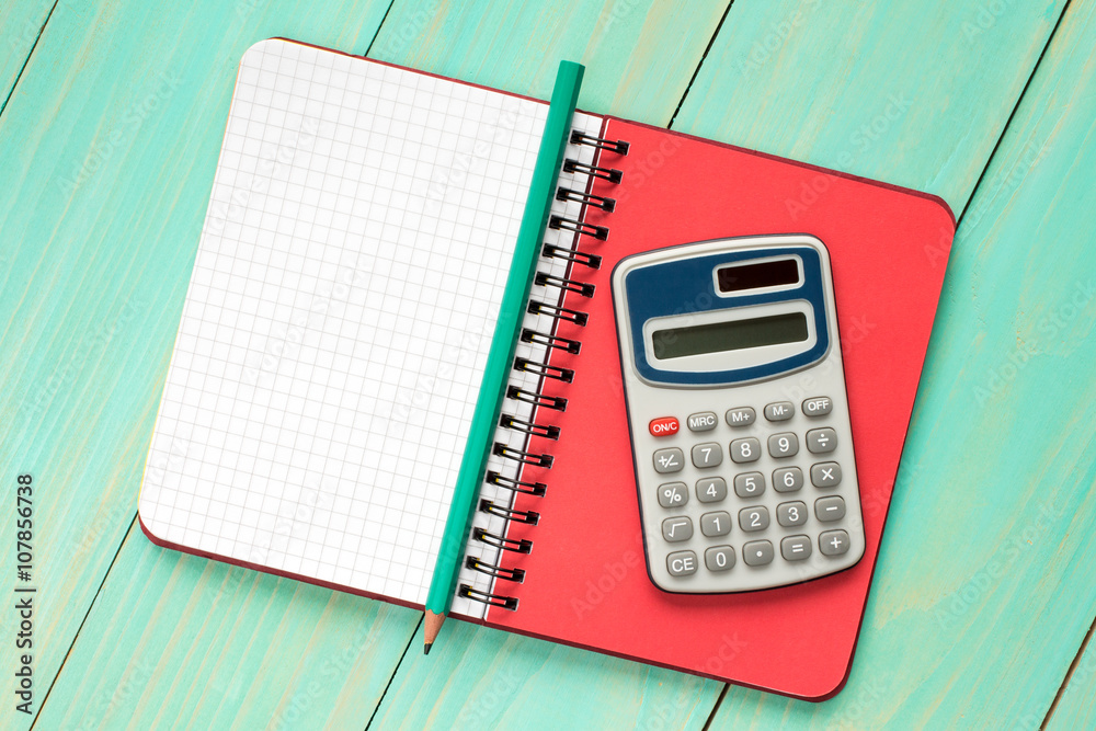 Electronic calculator and notebook. Electronic calculator and notebook.