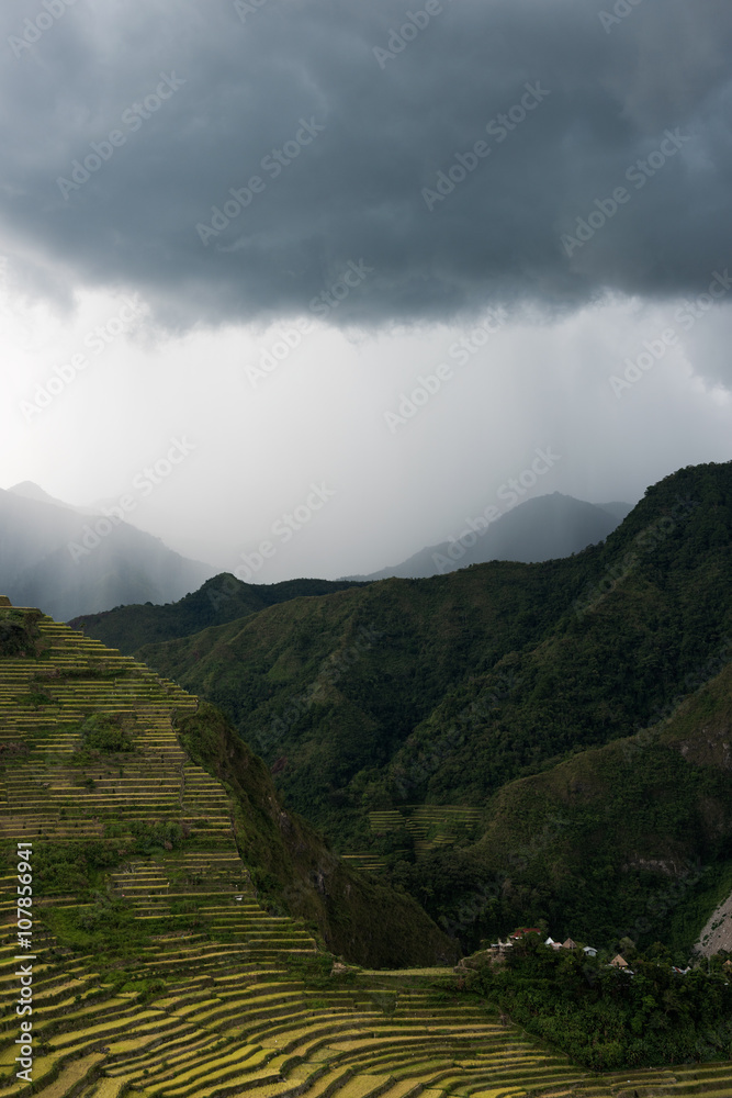 Batad rice terraces during a tropical storm in Banaue, Ifuego , Philippines.  Batad is situated among the Ifugao rice terraces. It is perhaps the best place to view this UNESCO World Heritage site.