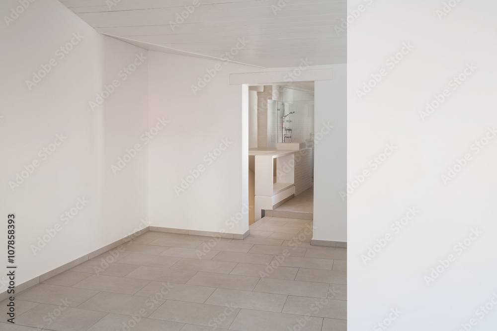 Interior, empty room with withe walls