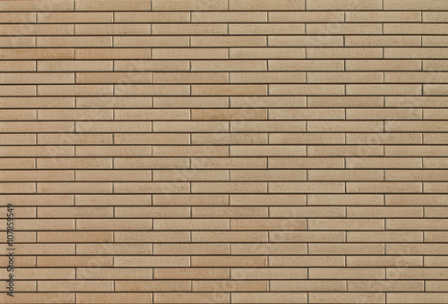 Light brown brick wall background pattern