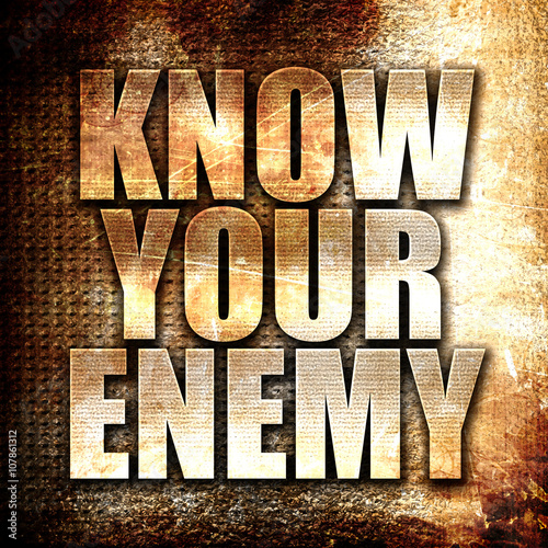 know your enemy, written on vintage metal texture