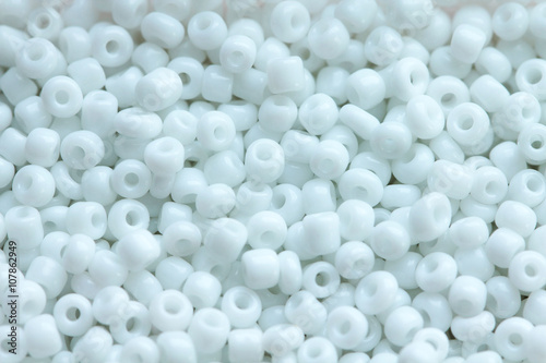 Beads of white colour close up macro photo