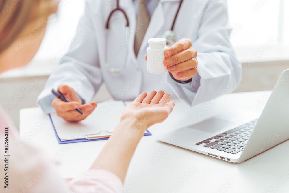 Fototapeta premium Woman at doctor