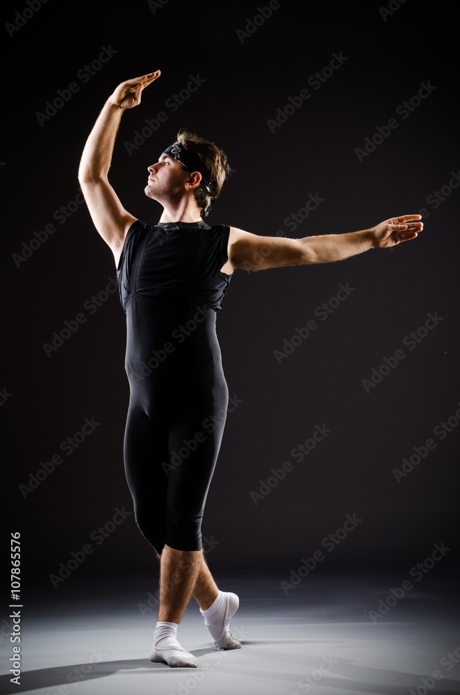 Young man training for ballet dances