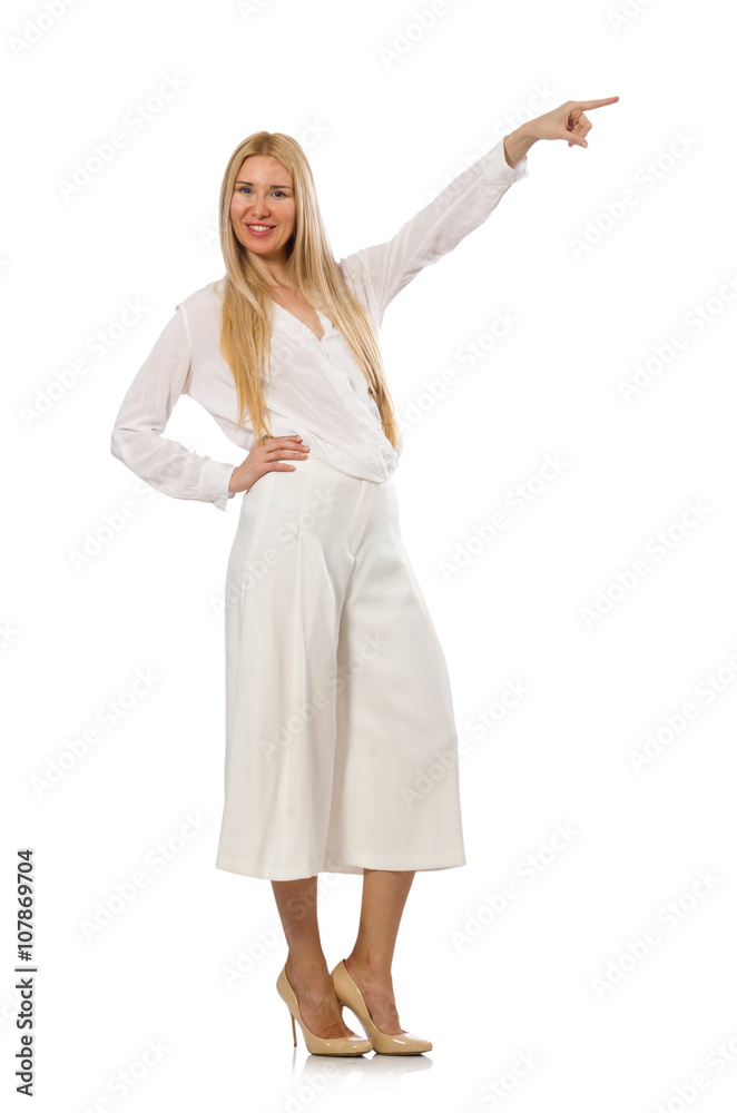 Blond hair model in elegant flared pants isolated on white Blond hair model in elegant flared pants isolated on white