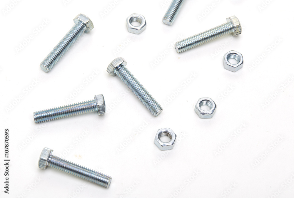 Bolts and nuts and washers on white paper
Bolts and nuts and washers on white paper
