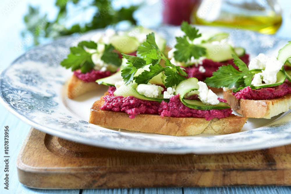 Sandwich with beetroot hummus,cucumber and feta. Sandwich with beetroot hummus,cucumber and feta.