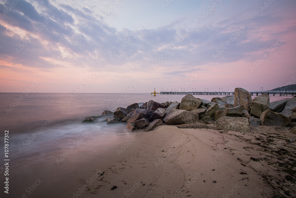 Sunrise over the pierr. sunrise in Orlowo, Gdynia