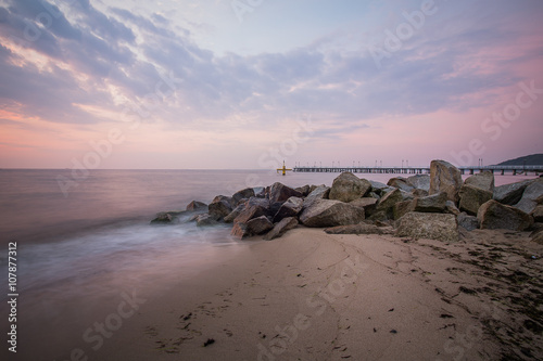 Sunrise over the pierr. sunrise in Orlowo, Gdynia