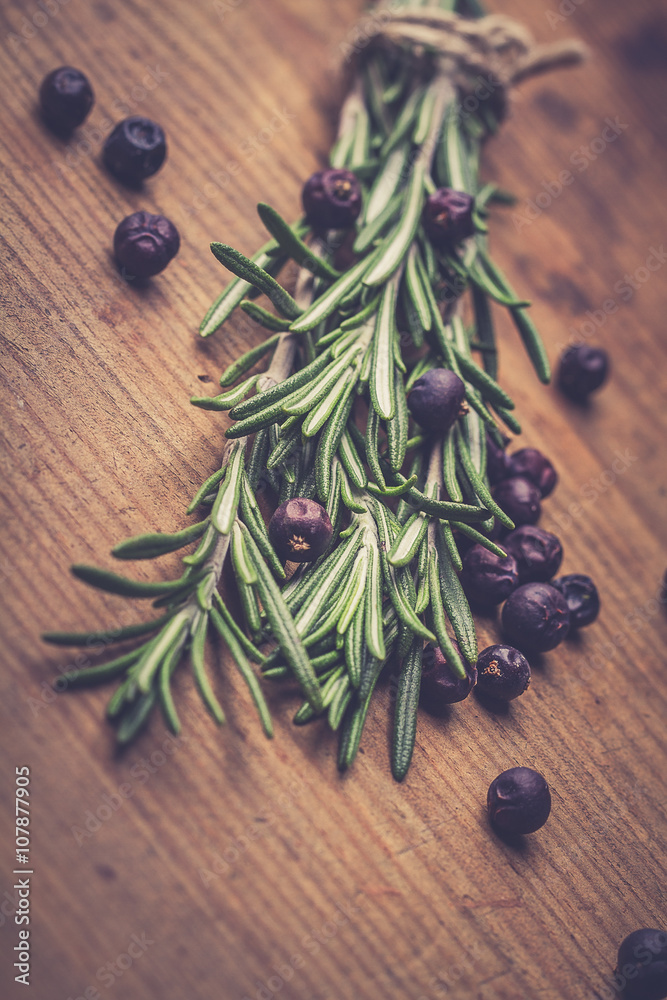 Organic bunch of fresh rosemary on the table Organic bunch of fresh rosemary on the table