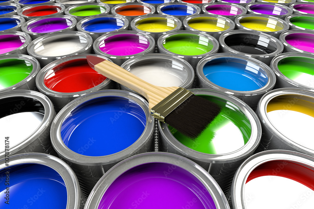 Multiple open paint cans with a brush. Multiple open paint cans with a brush.