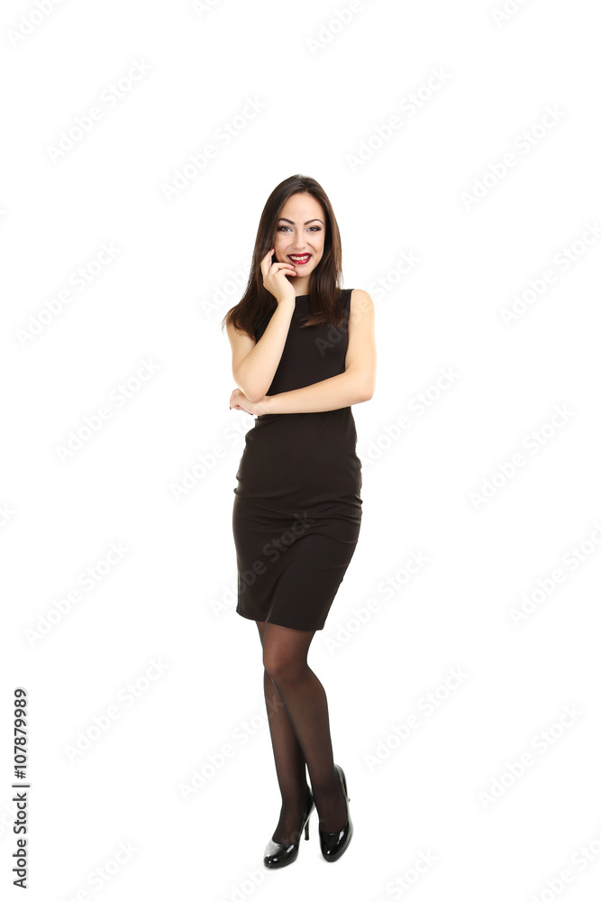 Young brunette woman in black dress on a white background Young brunette woman in black dress on a white background