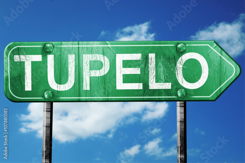 tupelo road sign , worn and damaged look photo