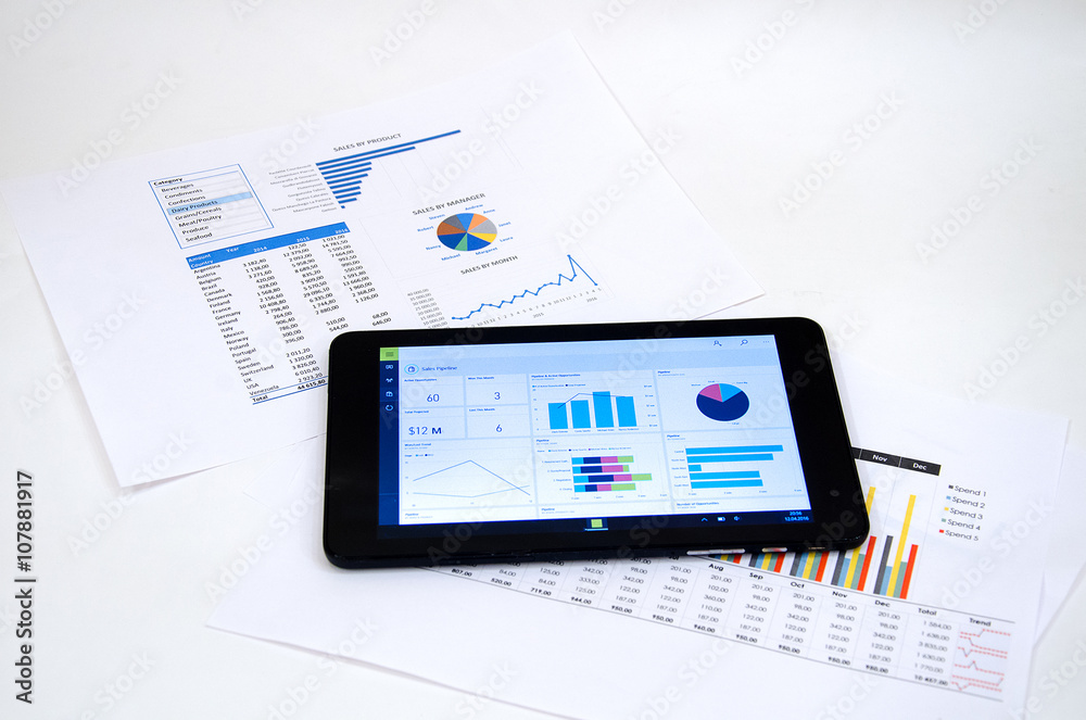 Naklejka premium Finance dashboard and tablet