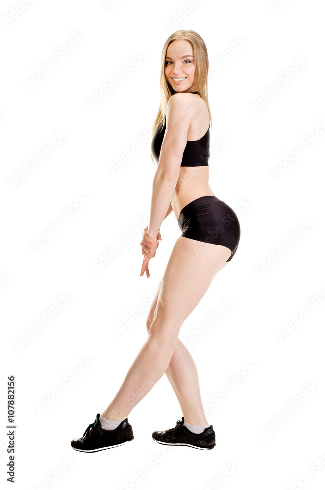 Young muscular woman posing