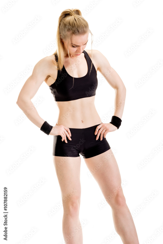 Young muscular woman posing Young muscular woman posing