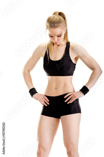 Young muscular woman posing