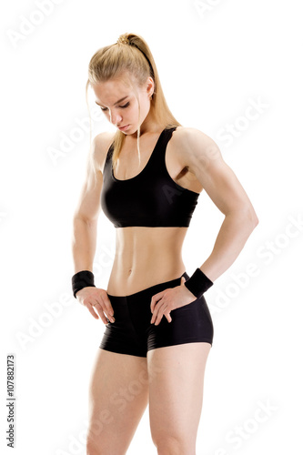 Young muscular woman posing