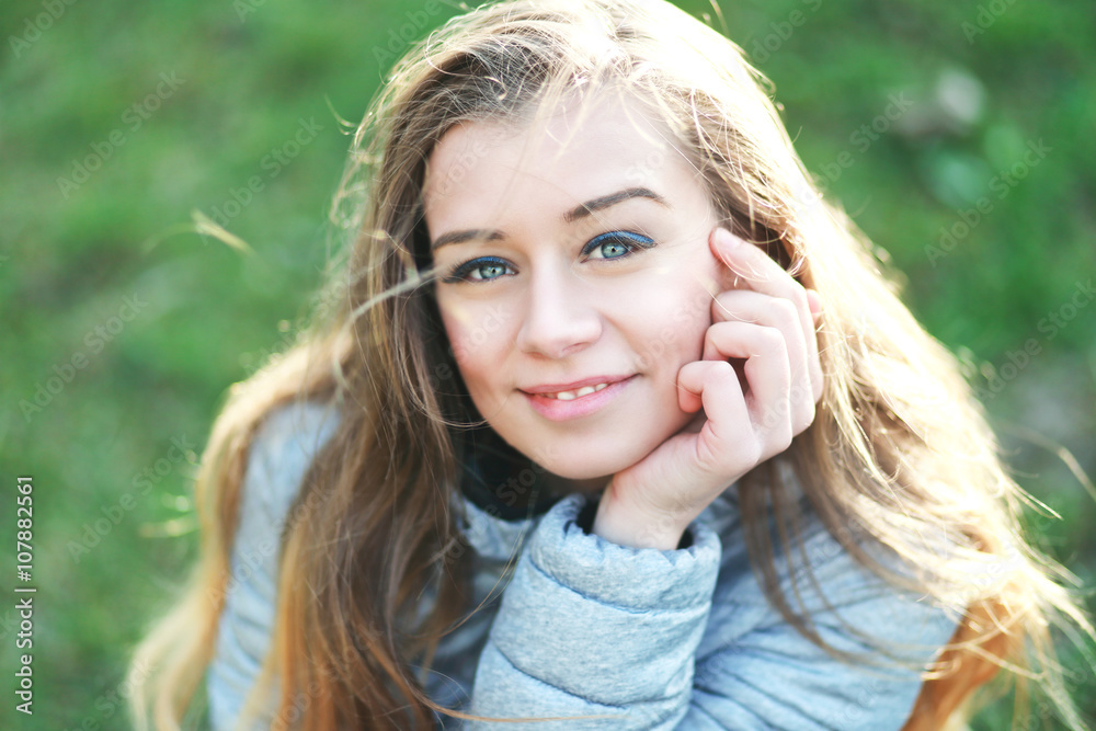 Naklejka premium cheerful young woman