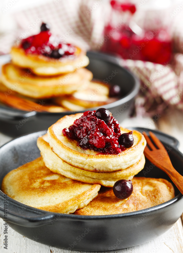 Stack of pancakes with blackcarrent jam Stack of pancakes with blackcarrent jam