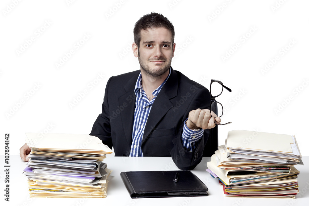 smiling businessman holding glasses and gesturing. smiling businessman holding glasses and gesturing.