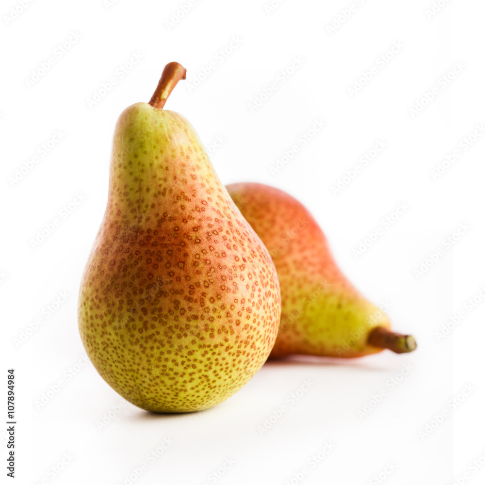 Pears group on wooden table and white background