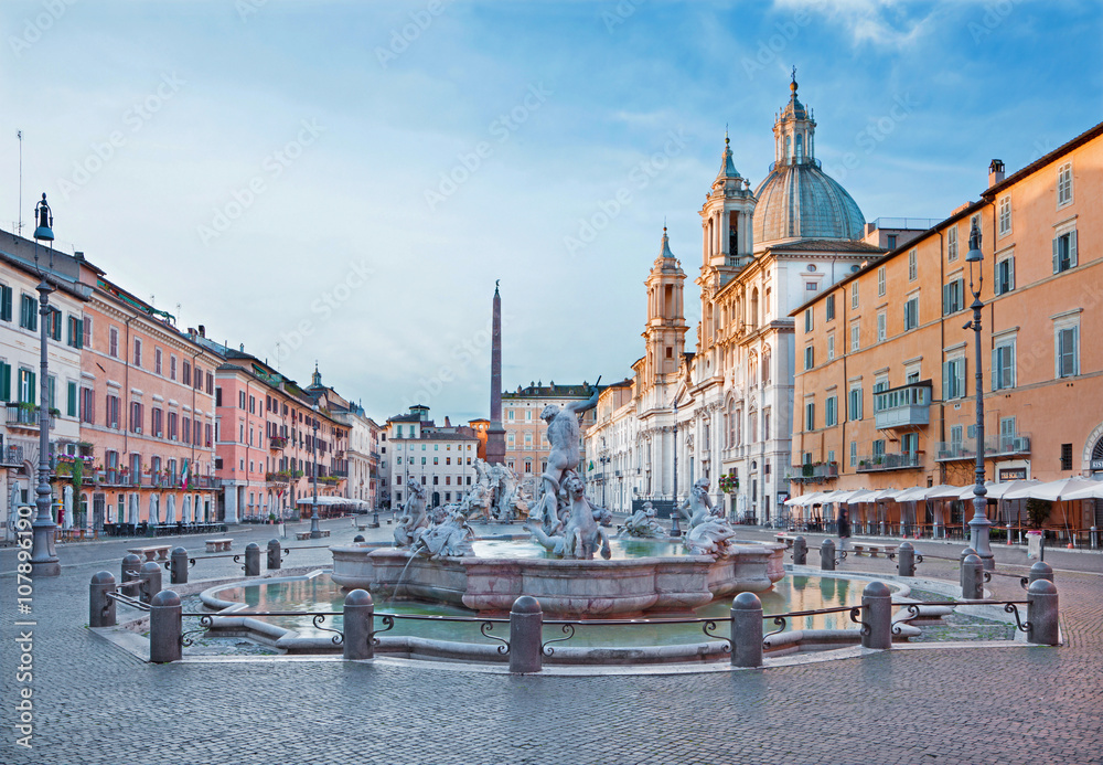 ROME, ITALY - MARCH 12, 2016: Piazza Navona in morning and Fountain of Neptune (1574) created by Giacomo della Porta and Santa Agnese in Agone church
