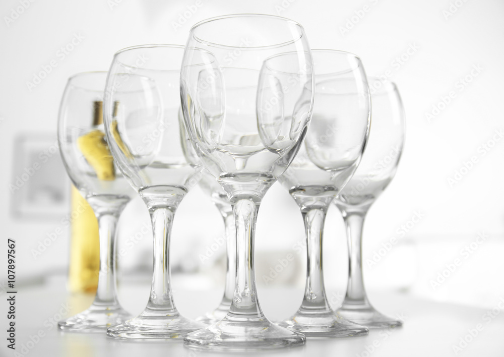 Wineglasses on blurred interior background Wineglasses on blurred interior background