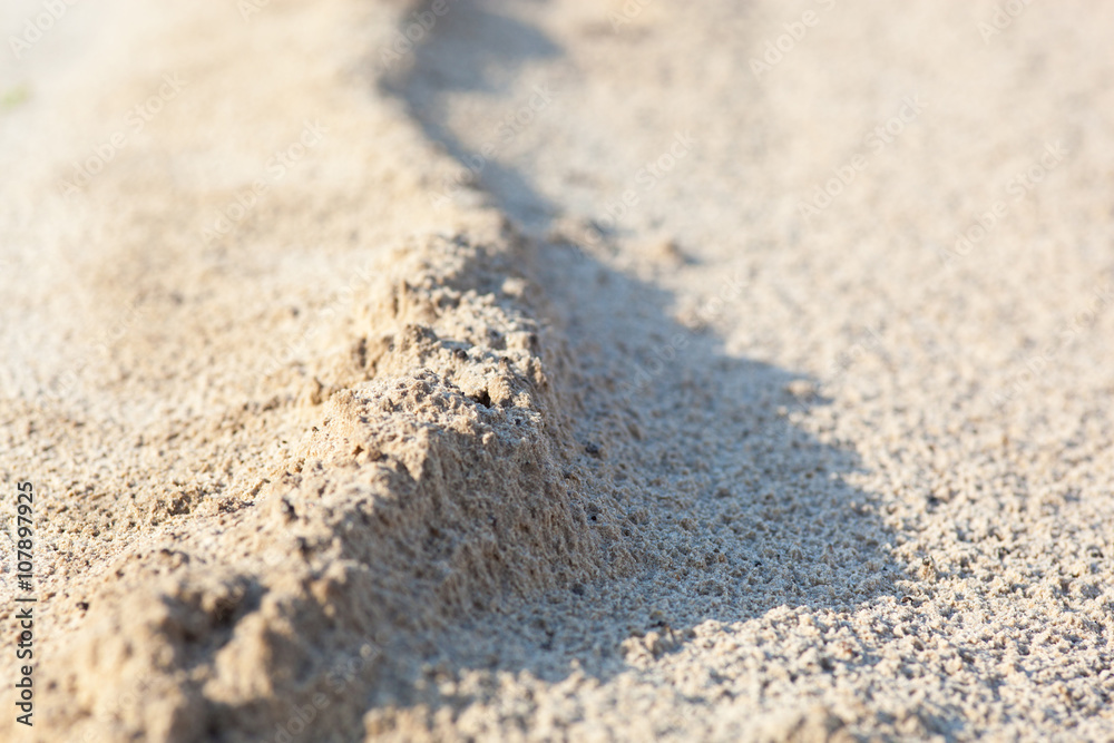 Sand surface with the relief formed by water currents Sand surface with the relief formed by water currents