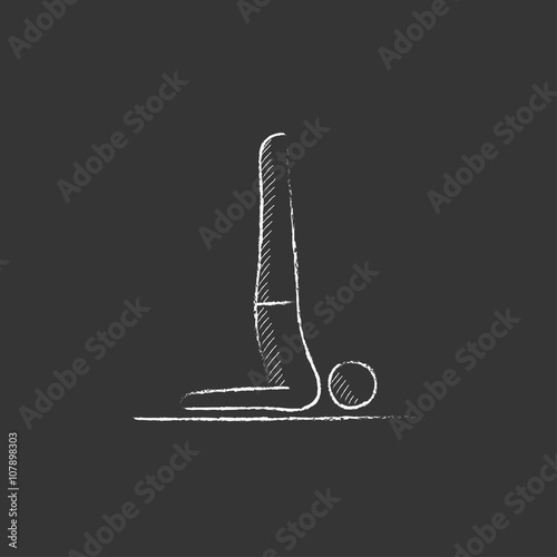 Man practicing yoga. Drawn in chalk icon.
