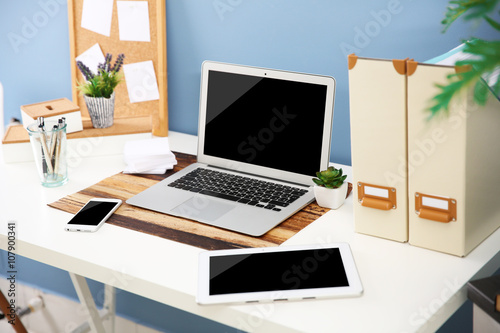 Workplace with different de...